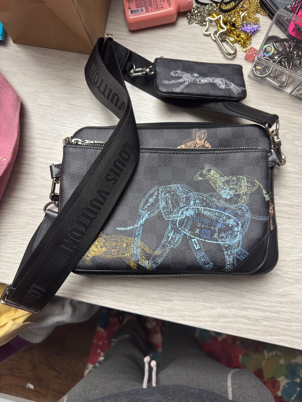 Special edition Louis Vuitton Trio messenger with unique travel stamp animals
